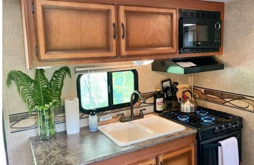 Decorah House | Hideaway Camper by the Cave & Waterfall, Kayak & Canoe Rentals, Trout Fishing