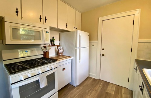 North of Grand Apartment | High Brick Haven near Ingersoll - Where Vintage Vibes & Comfort Collide!