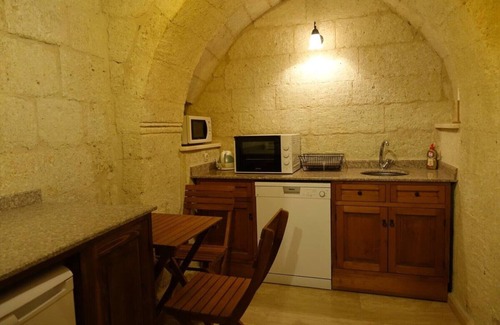 Urgup House | Hillside Stone House with Terrace
