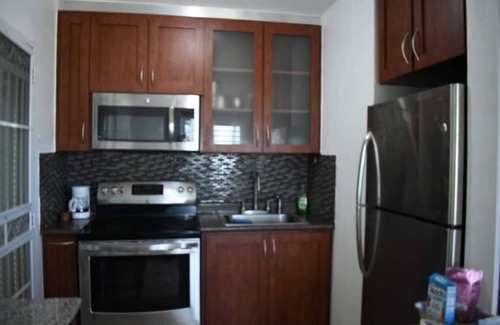 Florencio House | Hilltop Getaway with Ocean View, Huge Terrace & Outdoor Kitchen