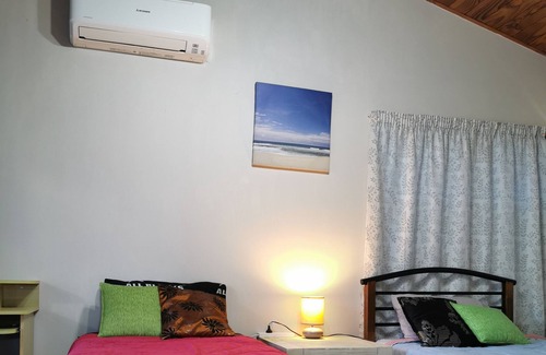 Titirangi House | Hilltop holiday home with stunning views.