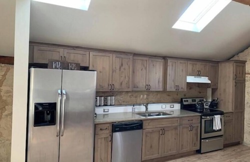 Solon House | Historic 1838 Stone Stable Hayloft rustic restored condominium sleeps 6