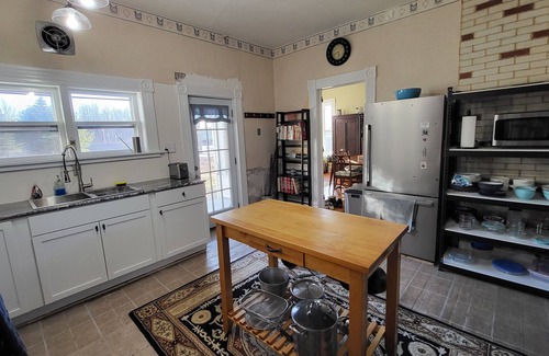 South Colton House | Historic 1840's home on Raquette River with creek, large lawn, view of waterfall