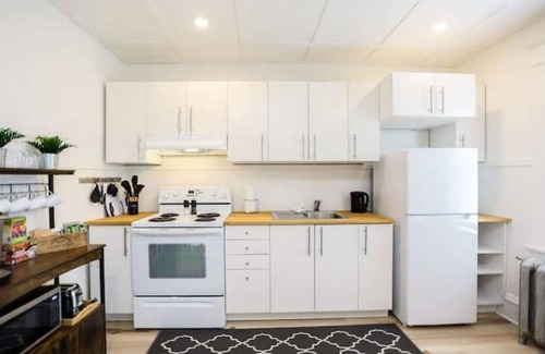 Winnipeg Apartment | Historic Charm in Norwood Flats: Walk to Parks, River Trails & The Forks!