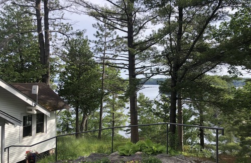 Seguin Cottage | Historic cottage with expansive views over north Lake Jo.