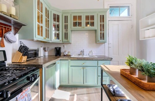 Faubourg Lafayette House | Historic Home Sleeps 12 |Close to FQ| Private Yard