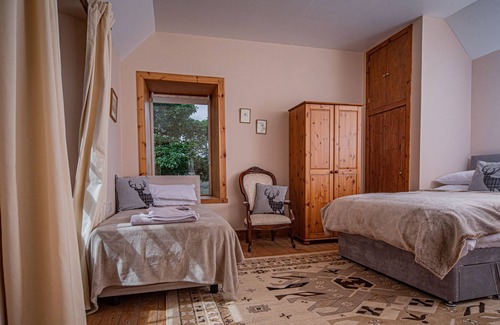Breakish Cottage | Historic home with mountain views and cosy Library