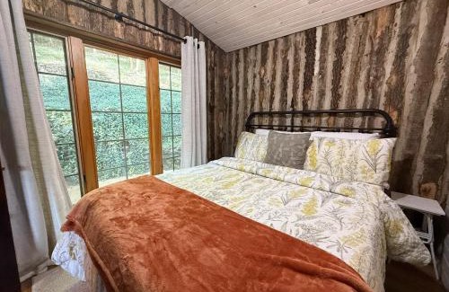 Camdenton House | Historic Lakefront Log Cabin4bd3badockfirepit