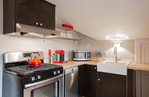 Lowry Hill East House | Historic Tudor Meets Modern Decor in Hip Uptown
