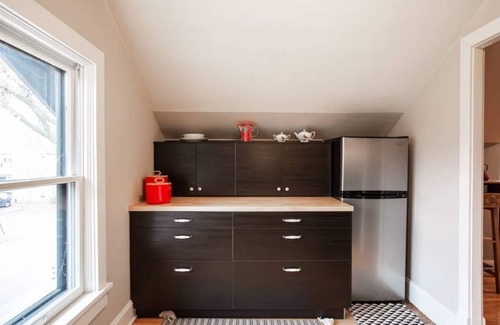 Lowry Hill East House | Historic Tudor Meets Modern Decor in Hip Uptown