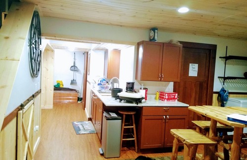Pine Island House | Hobby Farm Country Getaway 2 Bedroom Basement Apartment in Large Farmhouse