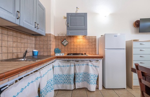Sant'Anna Arresi Apartment | Holiday Apartment "Sa Corte de Dinu" with Wi-Fi, Terrace & Garden