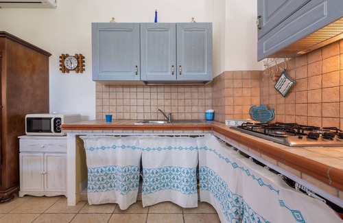 Sant'Anna Arresi Apartment | Holiday Apartment "Sa Corte de Dinu" with Wi-Fi, Terrace & Garden