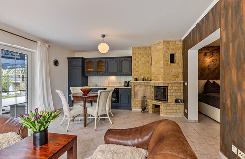 Groß Lindow Apartment | Holiday Apartment 'Am Wasser' with Lake View, Shared Terrace and Wi-Fi