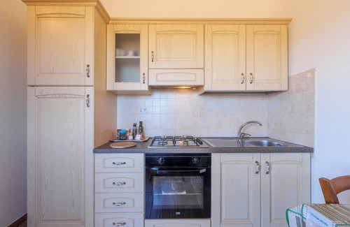 Aglientu Apartment | Holiday Apartment "Casa Mirto Con Piscina E Vista Mare" with Sea View, Shared Pool & Wi-Fi