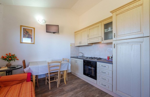 Aglientu Apartment | Holiday Apartment "Casa Ginepro Piscina E Vista Mare" with Sea View, Shared Pool & Wi-Fi