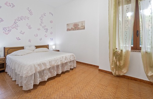 Gonnesa Apartment | Holiday Apartment "Casa Letizia" with Shared Garden & A/C