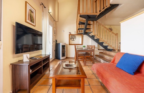 Pradollano Apartment | Holiday Apartment "Duplex 23 E" with Mountain View, Private Terrace & Wi-Fi