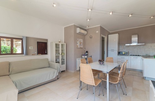 La Maddalena Apartment | Holiday Apartment "C 102 Puntavilla Mare" with Pool, Garden, Terrace, A/C & Wi-Fi