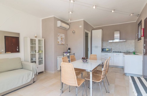 La Maddalena Apartment | Holiday Apartment "C 102 Puntavilla Mare" with Pool, Garden, Terrace, A/C & Wi-Fi