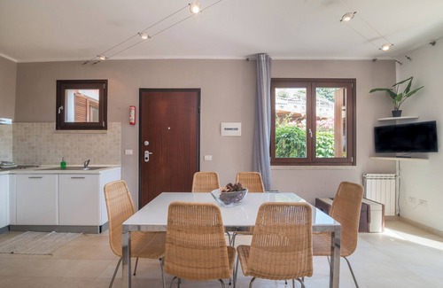 La Maddalena Apartment | Holiday Apartment "C 102 Puntavilla Mare" with Pool, Garden, Terrace, A/C & Wi-Fi