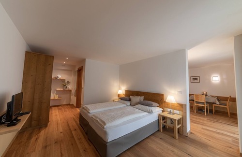Santa Valburga Apartment | Holiday Apartment 'Pöder Blaue Schneid' with Mountain View, Balcony, Shared Garden & Wi-Fi