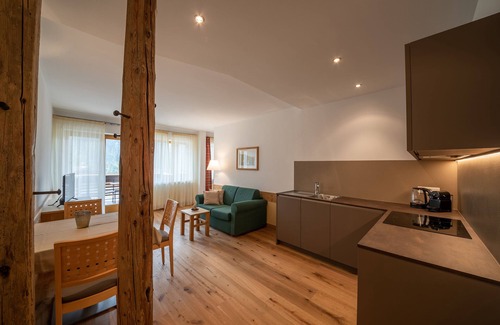 Santa Valburga Apartment | Holiday Apartment 'Pöder Goldlahn' with Mountain View, Balcony, Shared Garden & Wi-Fi
