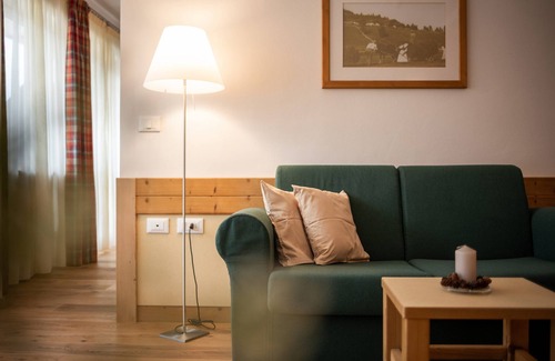 Santa Valburga Apartment | Holiday Apartment 'Pöder Goldlahn' with Mountain View, Balcony, Shared Garden & Wi-Fi