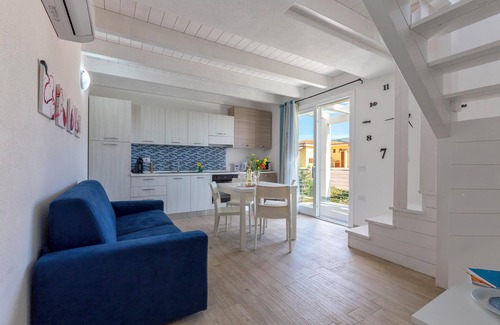Trinita d'Agultu e Vignola Apartment | Holiday Apartment “Sa Domo Mea Isola Rossa” with Sea View and Air Conditioning
