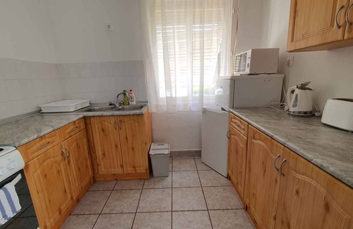 Siofok Apartment | Holiday apartment with a covered terrace and children's playground