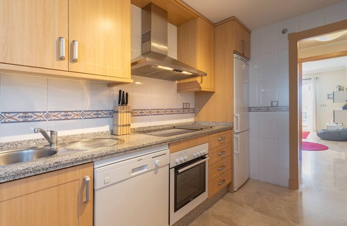 San Luis de Sabinillas Apartment | Holiday Apartment "Residencial Duquesa 06212b" with Shared Pool, Terrace & Wi-Fi