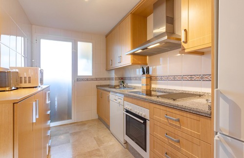 San Luis de Sabinillas Apartment | Holiday Apartment "Residencial Duquesa 06212b" with Shared Pool, Terrace & Wi-Fi