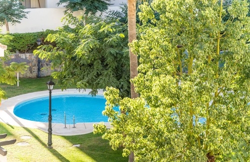 San Luis de Sabinillas Apartment | Holiday Apartment "Residencial Duquesa 06212b" with Shared Pool, Terrace & Wi-Fi