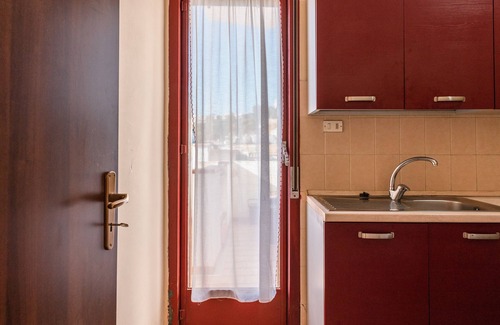 Seccagrande House | Holiday Home 'Appartamento C - Le Terrazze' with Sea View, Wi-Fi and Air Conditioning