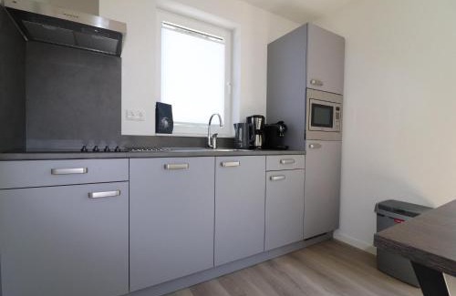 Municipality of Nissewaard House | Holiday Home by Lake Beach Simonshaven, cleaning included