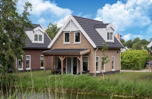 Municipality of Nissewaard House | Holiday Home by Lake Beach Simonshaven, cleaning included