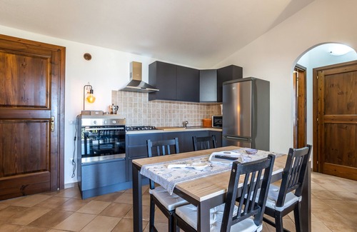 Badesi House | Holiday Home 'Casa Gio' with Sea View, Garden, Shared Pool & Wi-Fi