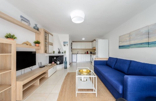 Santa Eulalia del Rio House | Holiday Home "Casita en Cala Llonga" with Sea View, Shared Garden & Pool