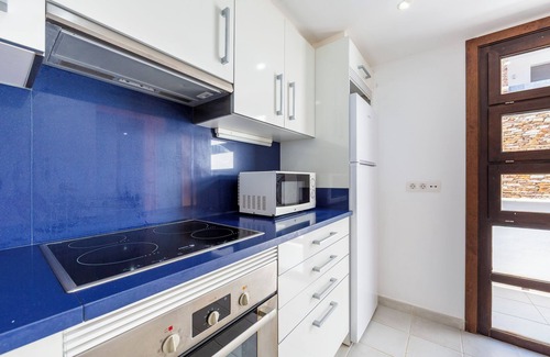 Playa Macenas House | Holiday Home 'Duplex Jlc' with Sea View, Shared Pool and Air Conditioning