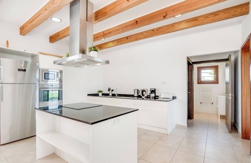 Petra House | Holiday Home Finca Na Blanca with Sea View, Pool, Wi-Fi, Terraces & Garden