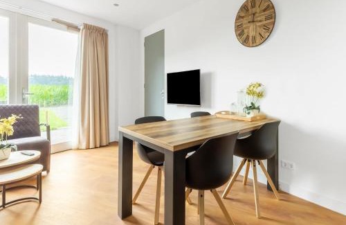 Municipality of Goirle House | Holiday Home in Forested Netherlands with Terrace, cleaning included