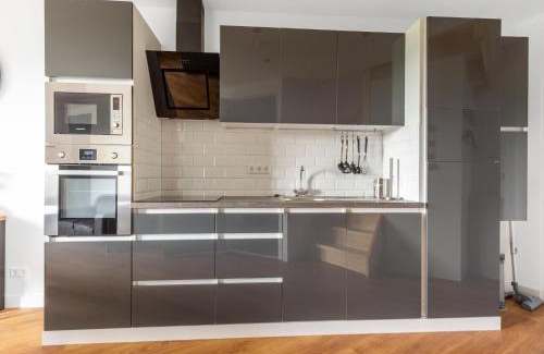 Municipality of Goirle House | Holiday Home in Forested Netherlands with Terrace, cleaning included