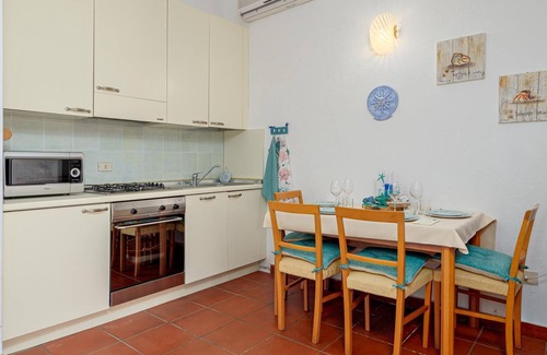 Palau House | Holiday Home 'La Casedda Di Nina' with Sea View, Private Terrace and Air Conditioning
