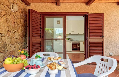 Palau House | Holiday Home 'La Casedda Di Nina' with Sea View, Private Terrace and Air Conditioning