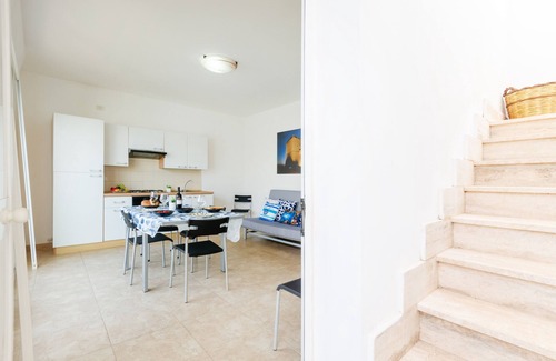 Boncore House | Holiday Home 'Libeccio Luxury Torre Lapillo' with Sea View, Shared Pool and Wi-Fi