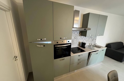Gonnesa House | Holiday Home 'Luciano' with Private Terrace, Wi-Fi and Air Conditioning
