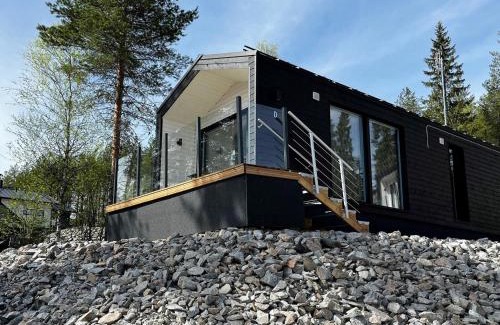 Kehys-Kainuu House | Holiday Home Rakkaranta d- beach house- two skipasses by Interhome