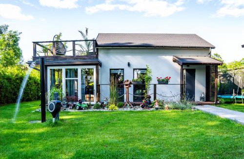 gmina Wolin House | Holiday Home Small Vegas- JACUZZI AND GARTEN FOR EXCLUSIVE USE