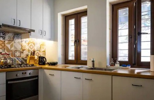 Aidonia House | Holiday Home 'Stone House Amalthia' with Sea View, Private Terrace and Wi-Fi