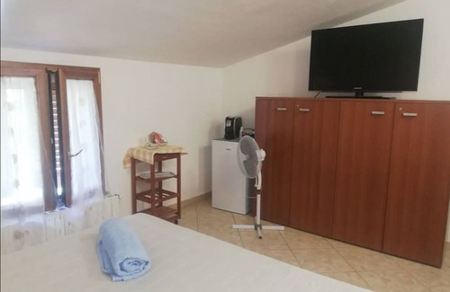 Calangianus House | Holiday Home 'Tra Montagna e Mare' with Mountain View, Private Terrace and Wi-Fi